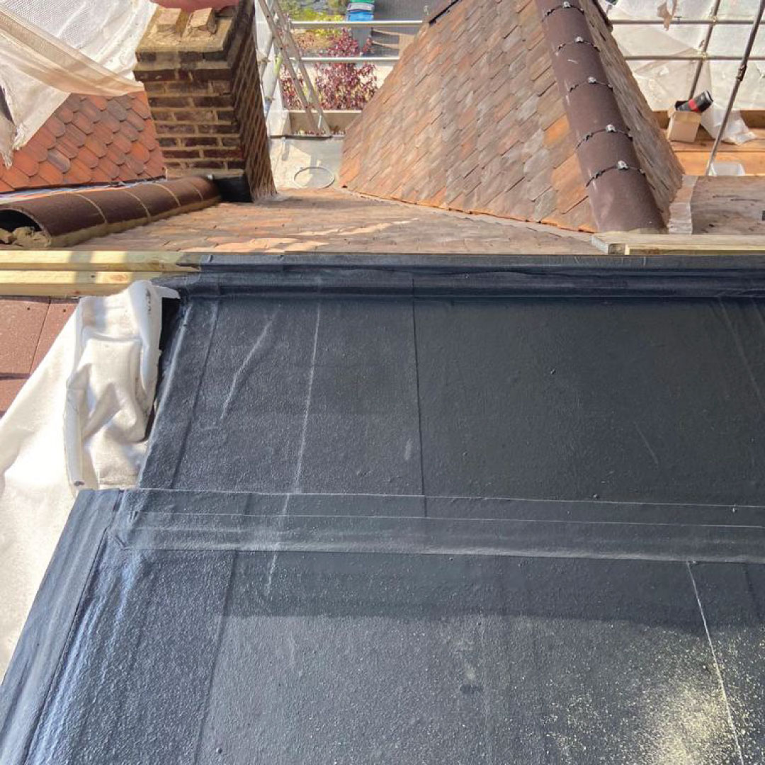 warm flat roof being laid