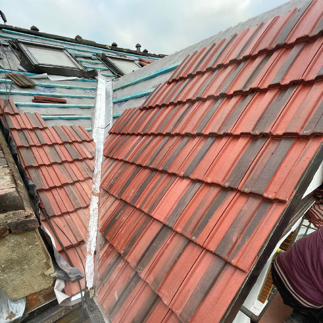 roof valley repair work in progress