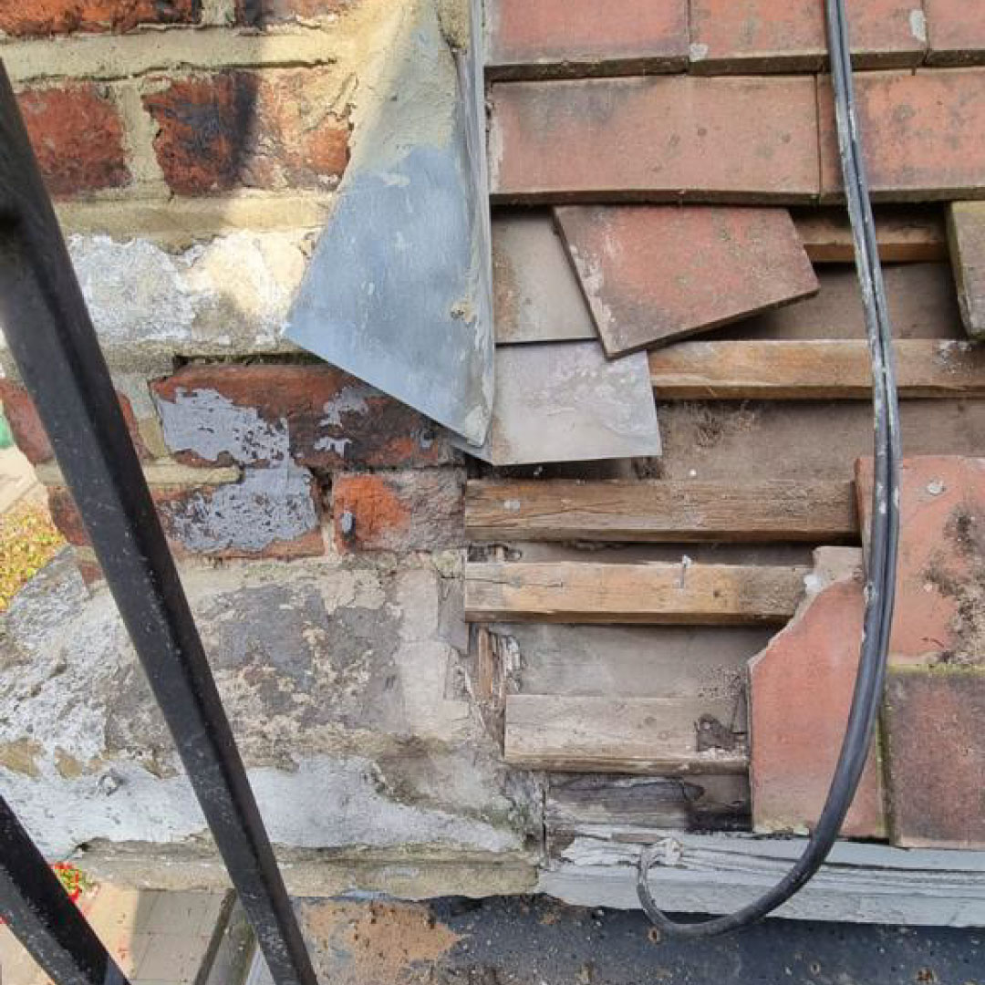 damaged roof with missing tiles 