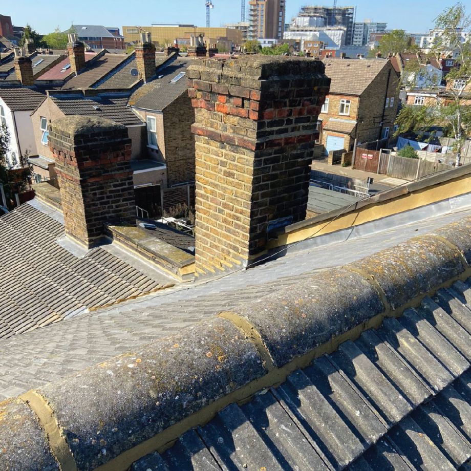 urban ariel view of roofs and chimneys